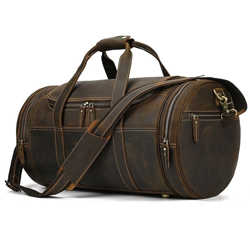 sac de voyager cuir marron vintage avec bandoulière vu de côté 